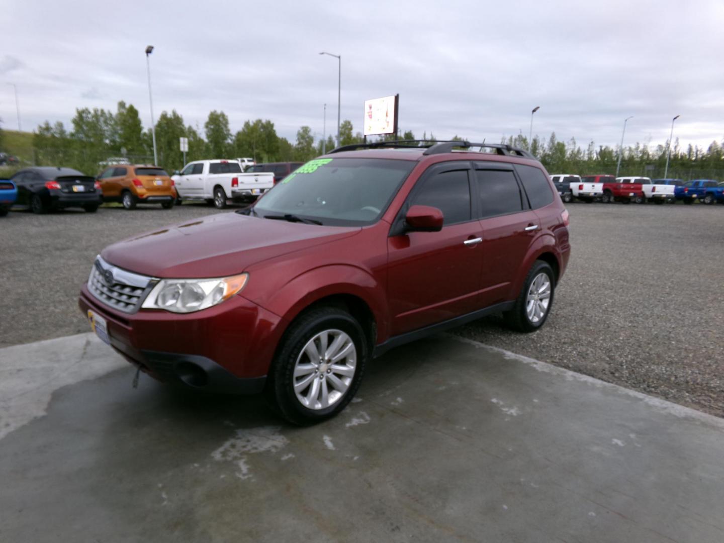 2011 Red Subaru Forester 2.5X Premium (JF2SHADC1BH) with an 2.5L H4 SOHC 16V engine, Automatic transmission, located at 2630 Philips Field Rd., Fairbanks, AK, 99709, (907) 458-0593, 64.848068, -147.780609 - Photo#0