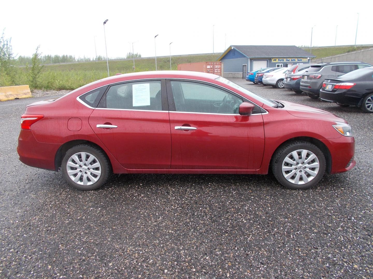 2017 Red Nissan Sentra SV 6MT (3N1AB7AP6HL) with an 1.8L L4 SFI DOHC 16V engine, 6 Speed Auto transmission, located at 2630 Philips Field Rd., Fairbanks, AK, 99709, (907) 458-0593, 64.848068, -147.780609 - Photo#2