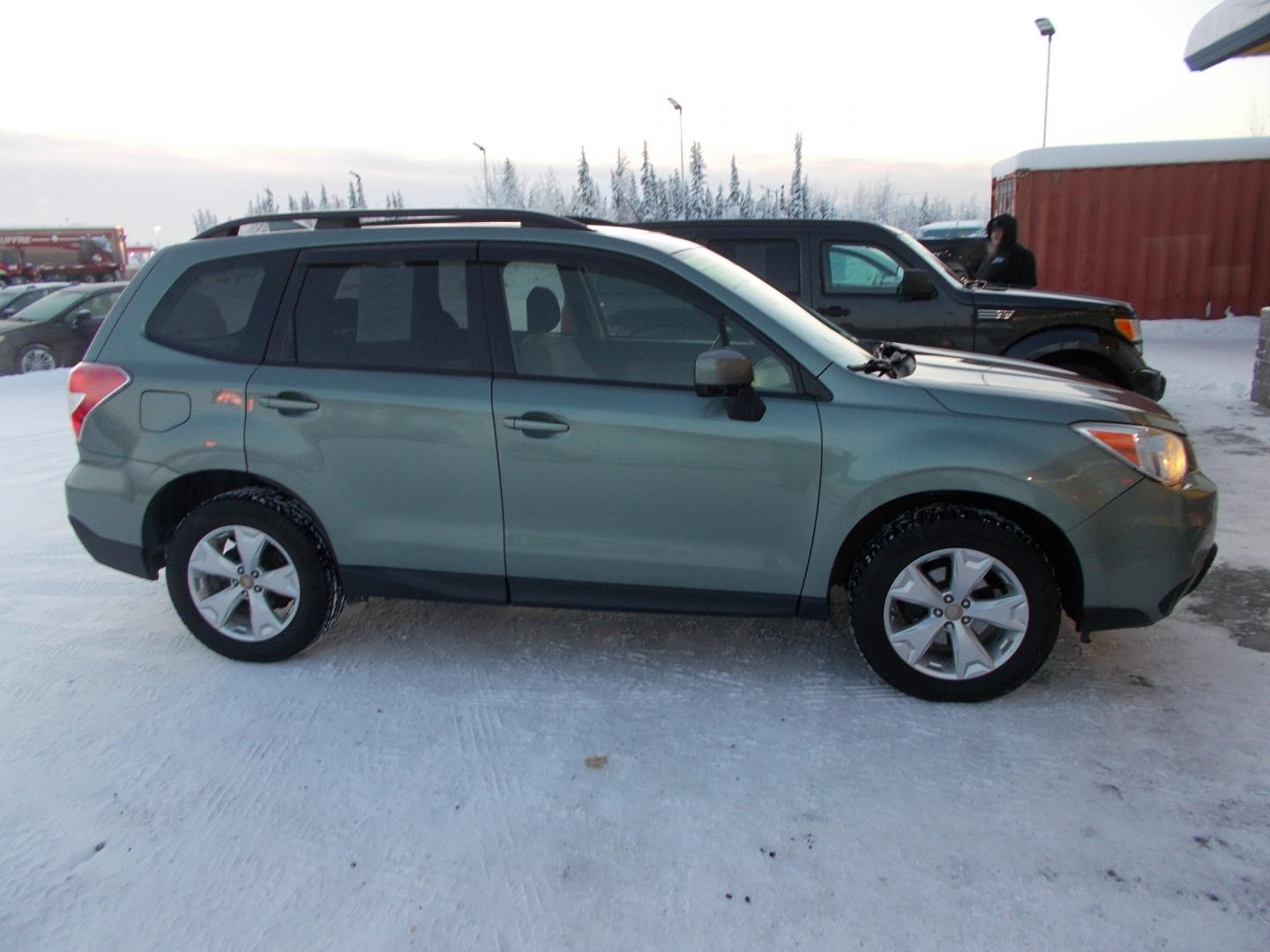 2016 Blue Subaru Forester 2.5i Premium PZEV CVT (JF2SJADC1GH) with an 2.5L H4 SOHC 16V engine, CVT transmission, located at 2630 Philips Field Rd., Fairbanks, AK, 99709, (907) 458-0593, 64.848068, -147.780609 - Photo#2