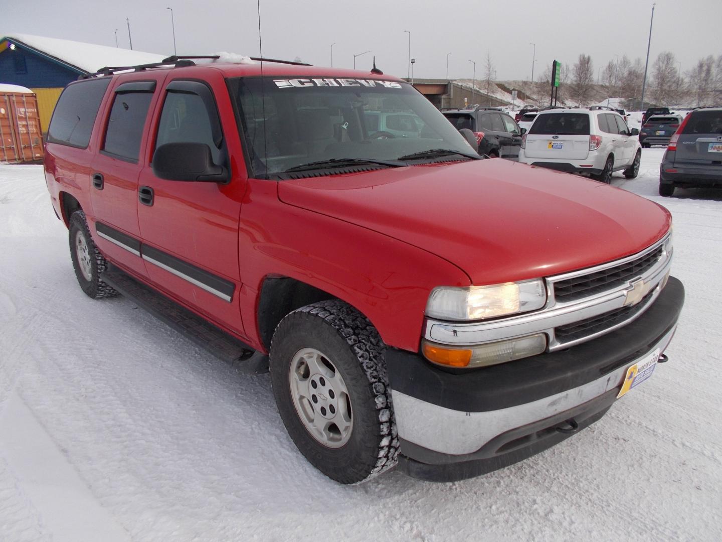 2005 Red Chevrolet Suburban 1500 4WD (1GNFK16Z65J) with an 5.3L V8 OHV 16V FFV engine, 4-Speed Automatic Overdrive transmission, located at 2630 Philips Field Rd., Fairbanks, AK, 99709, (907) 458-0593, 64.848068, -147.780609 - Photo#0