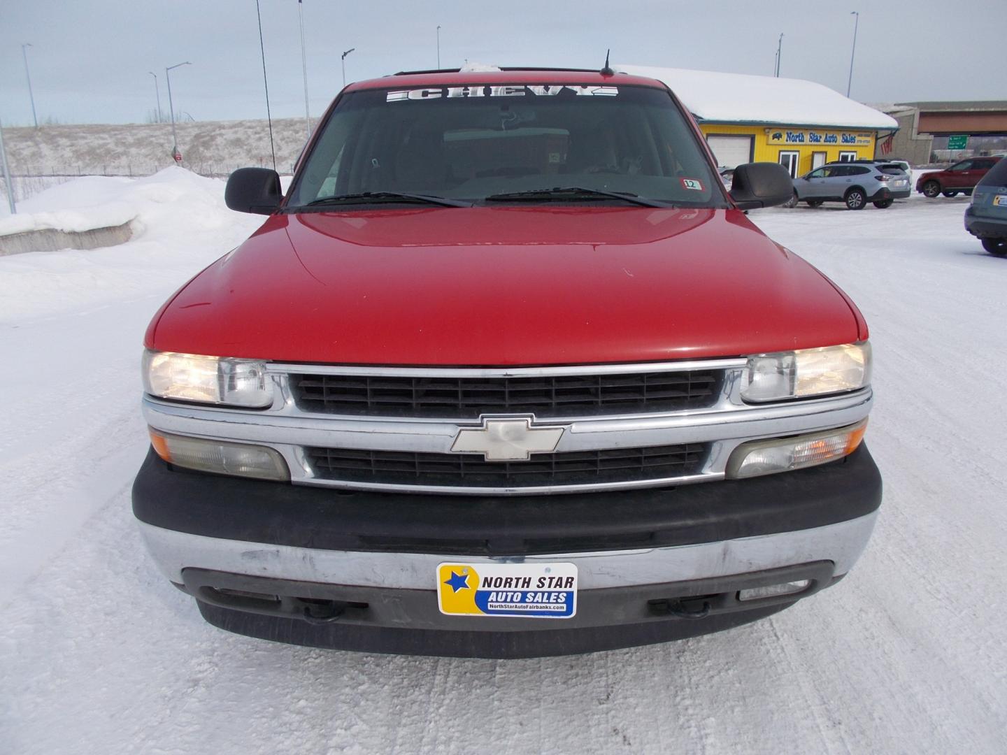 2005 Red Chevrolet Suburban 1500 4WD (1GNFK16Z65J) with an 5.3L V8 OHV 16V FFV engine, 4-Speed Automatic Overdrive transmission, located at 2630 Philips Field Rd., Fairbanks, AK, 99709, (907) 458-0593, 64.848068, -147.780609 - Photo#1