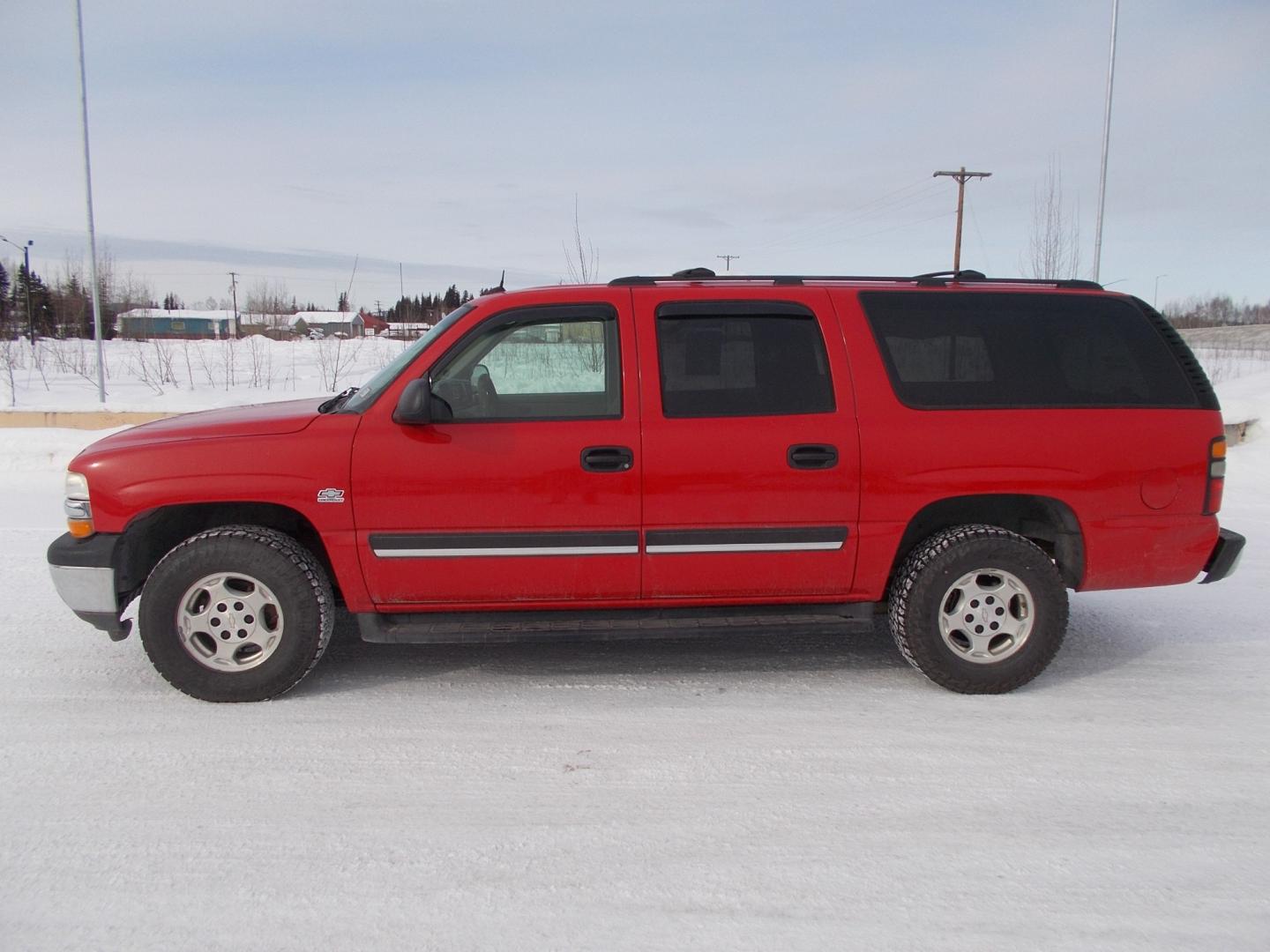 2005 Red Chevrolet Suburban 1500 4WD (1GNFK16Z65J) with an 5.3L V8 OHV 16V FFV engine, 4-Speed Automatic Overdrive transmission, located at 2630 Philips Field Rd., Fairbanks, AK, 99709, (907) 458-0593, 64.848068, -147.780609 - Photo#2