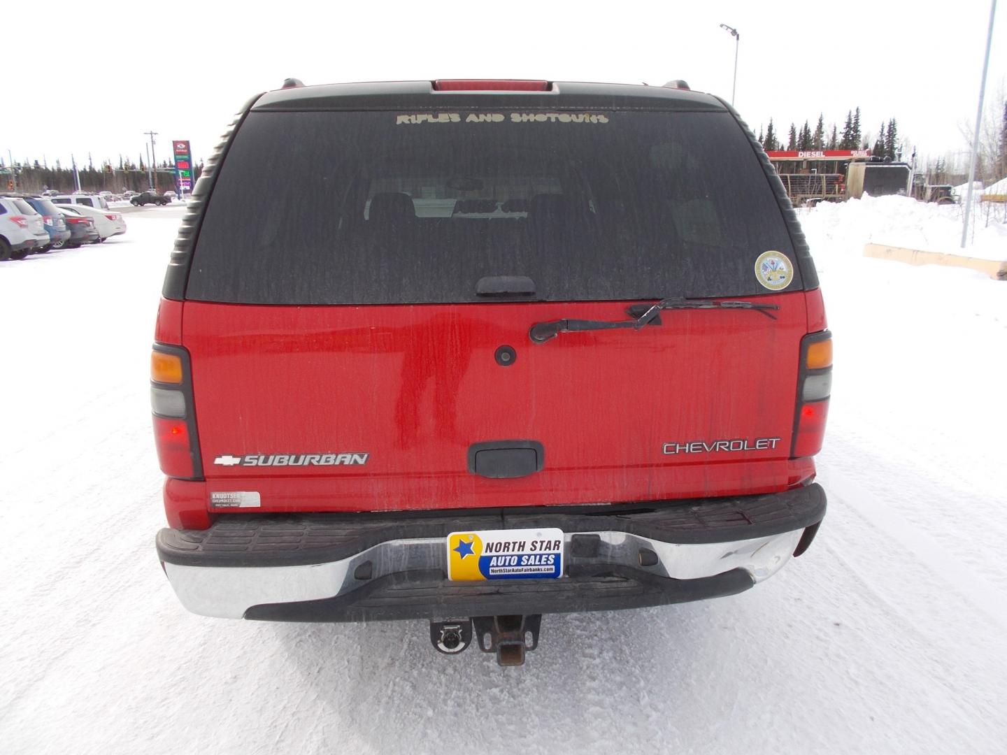 2005 Red Chevrolet Suburban 1500 4WD (1GNFK16Z65J) with an 5.3L V8 OHV 16V FFV engine, 4-Speed Automatic Overdrive transmission, located at 2630 Philips Field Rd., Fairbanks, AK, 99709, (907) 458-0593, 64.848068, -147.780609 - Photo#3