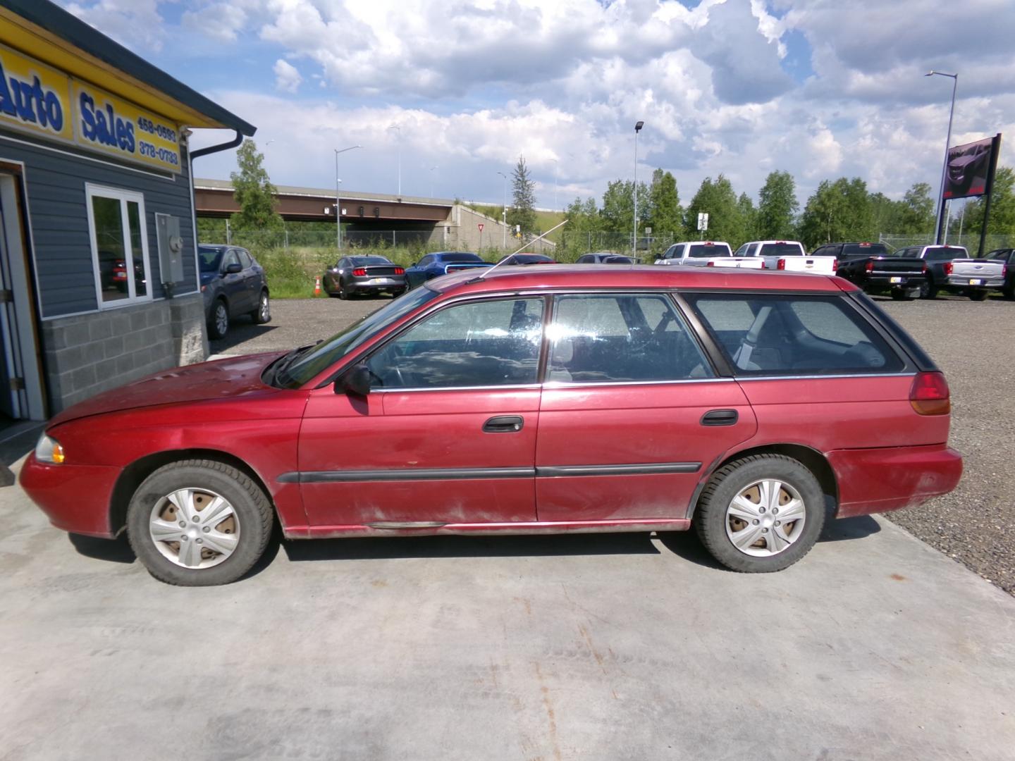 1997 Red /Black Subaru Legacy Wagon Brighton AWD (4S3BK4259V7) with an 2.2L H4 SOHC 16V engine, 4-Speed Automatic Overdrive transmission, located at 2630 Philips Field Rd., Fairbanks, AK, 99709, (907) 458-0593, 64.848068, -147.780609 - Photo#2