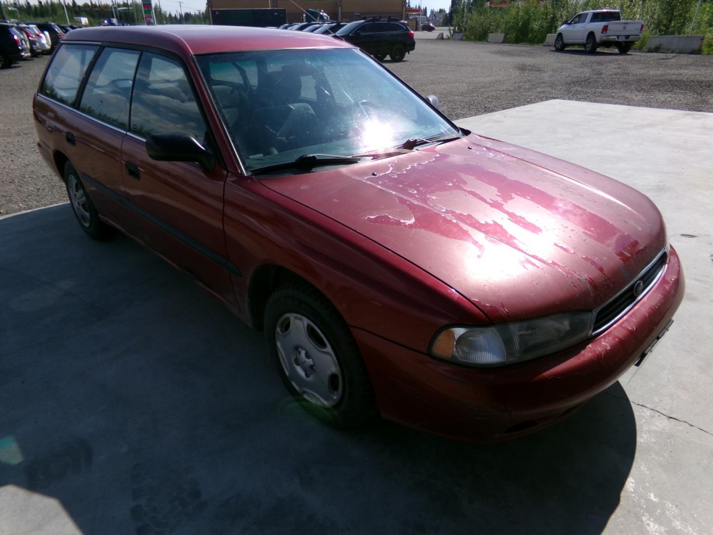 1997 Red /Black Subaru Legacy Wagon Brighton AWD (4S3BK4259V7) with an 2.2L H4 SOHC 16V engine, 4-Speed Automatic Overdrive transmission, located at 2630 Philips Field Rd., Fairbanks, AK, 99709, (907) 458-0593, 64.848068, -147.780609 - Photo#0