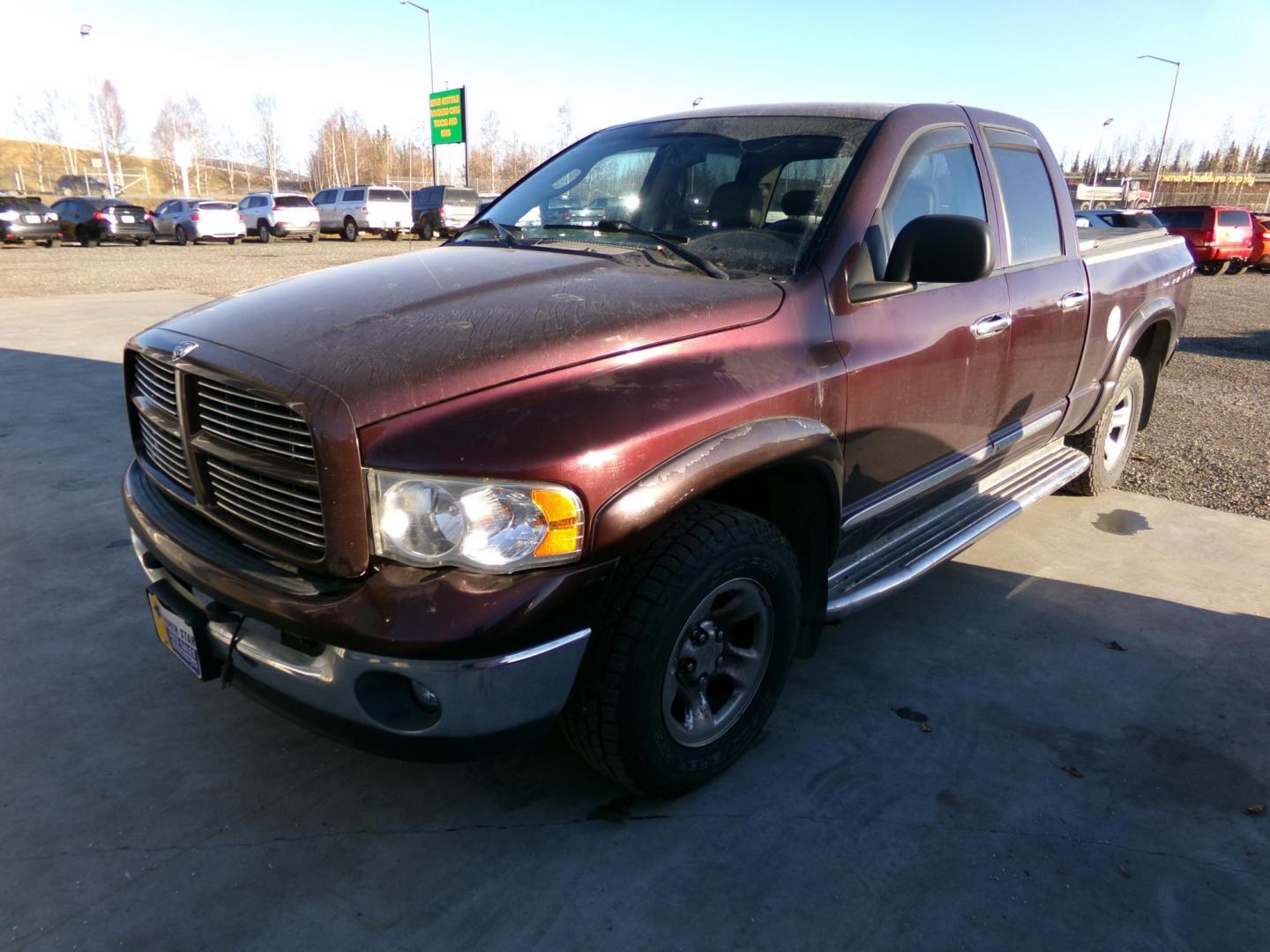 2004 Purple Dodge Ram 1500 Laramie Quad Cab 4WD (1D3HU18D74J) with an 5.7L V8 OHV 16V engine, 5-Speed Automatic Overdrive transmission, located at 2630 Philips Field Rd., Fairbanks, AK, 99709, (907) 458-0593, 64.848068, -147.780609 - Photo#0