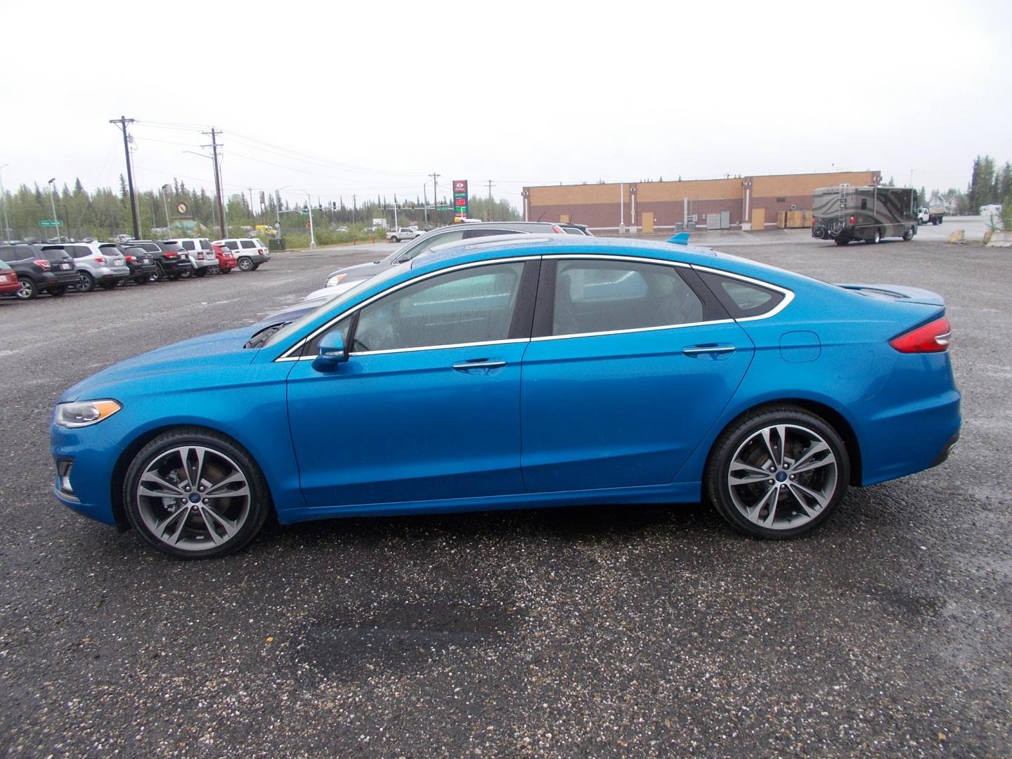 2020 Blue Ford Fusion Titanium AWD (3FA6P0D90LR) with an 2.0L L4 DOHC 16V engine, 6A transmission, located at 2630 Philips Field Rd., Fairbanks, AK, 99709, (907) 458-0593, 64.848068, -147.780609 - Photo#2