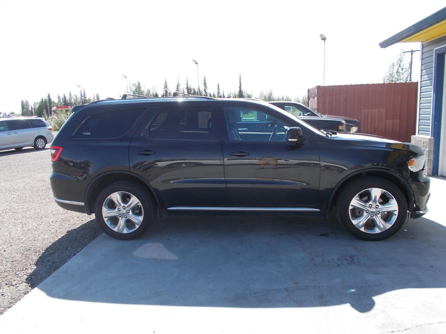 2014 Blue /Black Dodge Durango Limited AWD (1C4RDJDG3EC) with an 3.6L V6 DOHC 24V engine, 8-Speed Automatic transmission, located at 2630 Philips Field Rd., Fairbanks, AK, 99709, (907) 458-0593, 64.848068, -147.780609 - Photo#2