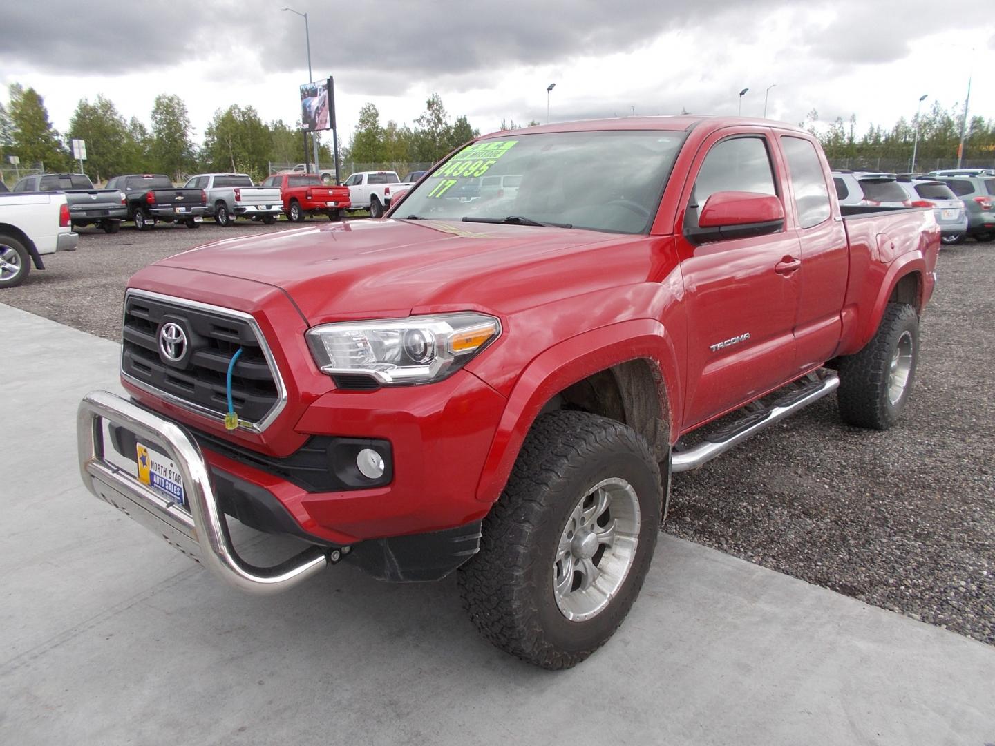 2017 Red Toyota Tacoma SR5 Access Cab V6 6AT 4WD (5TFSZ5AN6HX) with an 3.5L V6 DOHC 24V engine, 6A transmission, located at 2630 Philips Field Rd., Fairbanks, AK, 99709, (907) 458-0593, 64.848068, -147.780609 - Photo#0