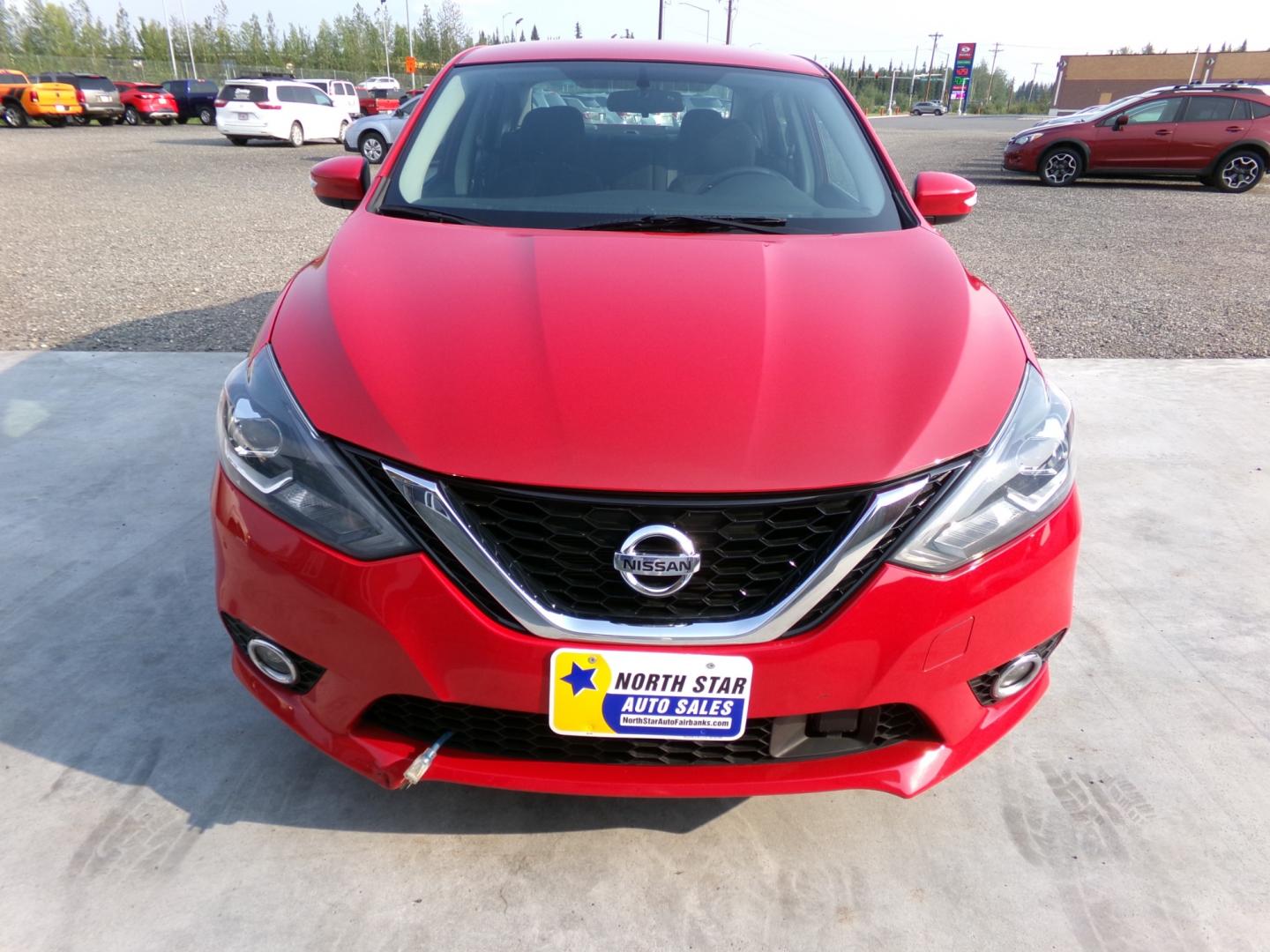 2019 Red Nissan Sentra S CVT (3N1AB7AP0KY) with an 1.8L L4 SFI DOHC 16V engine, CVT transmission, located at 2630 Philips Field Rd., Fairbanks, AK, 99709, (907) 458-0593, 64.848068, -147.780609 - Photo#1