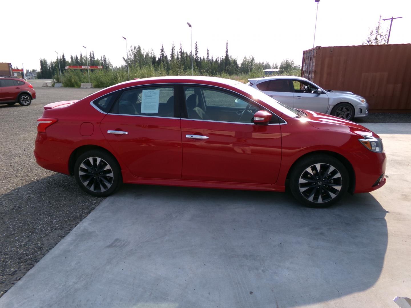 2019 Red Nissan Sentra S CVT (3N1AB7AP0KY) with an 1.8L L4 SFI DOHC 16V engine, CVT transmission, located at 2630 Philips Field Rd., Fairbanks, AK, 99709, (907) 458-0593, 64.848068, -147.780609 - Photo#2