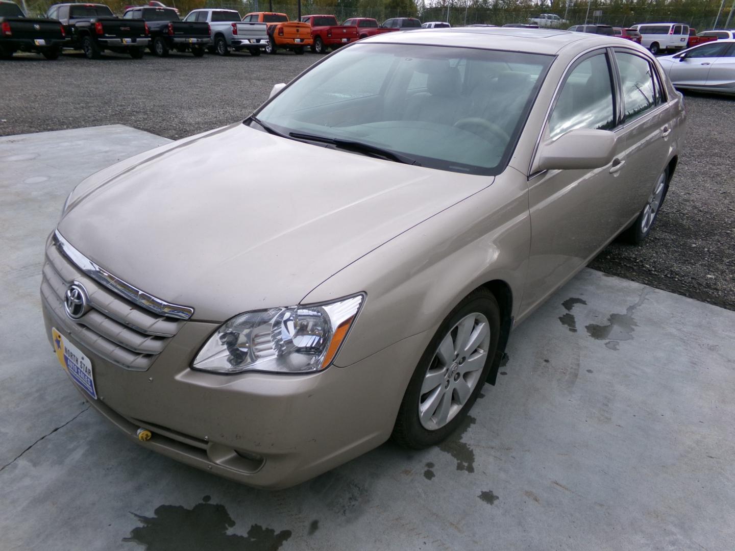 2007 Gold Toyota Avalon Limited (4T1BK36B87U) with an 3.5L V6 DOHC 24V engine, 5-Speed Automatic Overdrive transmission, located at 2630 Philips Field Rd., Fairbanks, AK, 99709, (907) 458-0593, 64.848068, -147.780609 - Photo#0