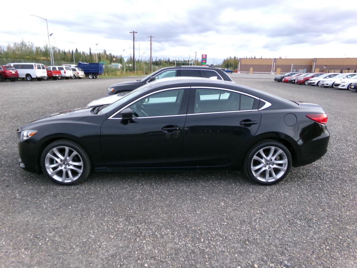 2017 Black Mazda Mazda6 i Touring AT (JM1GL1V51H1) with an 2.5L L4 DOHC 16V engine, 6A transmission, located at 2630 Philips Field Rd., Fairbanks, AK, 99709, (907) 458-0593, 64.848068, -147.780609 - Photo#2