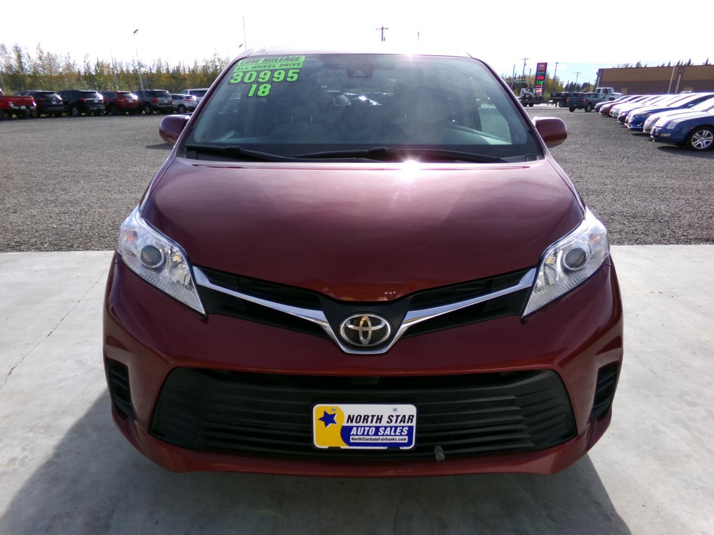 2018 Red Toyota Sienna LE 7-Passenger AWD (5TDJZ3DC2JS) with an 3.5L V6 EFI DOHC 24V engine, 8A transmission, located at 2630 Philips Field Rd., Fairbanks, AK, 99709, (907) 458-0593, 64.848068, -147.780609 - Photo#1