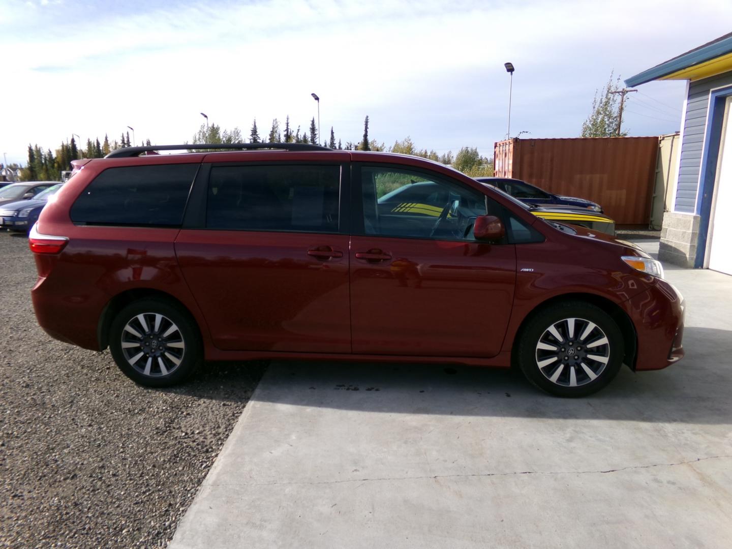 2018 Red Toyota Sienna LE 7-Passenger AWD (5TDJZ3DC2JS) with an 3.5L V6 EFI DOHC 24V engine, 8A transmission, located at 2630 Philips Field Rd., Fairbanks, AK, 99709, (907) 458-0593, 64.848068, -147.780609 - Photo#2