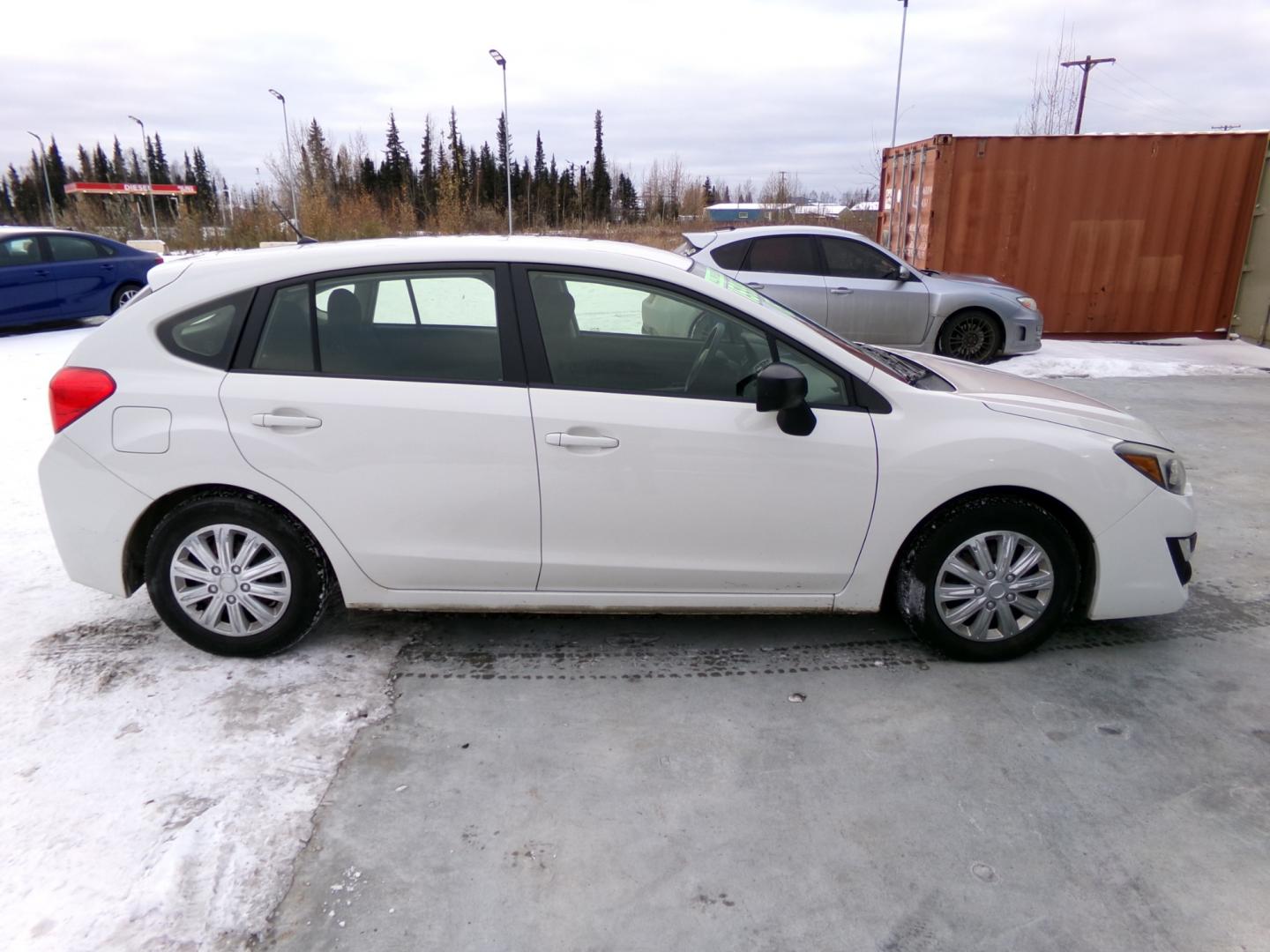 2015 White Subaru Impreza 2.0i PZEV CVT 5-Door (JF1GPAA6XF8) with an 2.0L H4 DOHC 16V engine, Continuously Variable Transmission transmission, located at 2630 Philips Field Rd., Fairbanks, AK, 99709, (907) 458-0593, 64.848068, -147.780609 - Photo#2