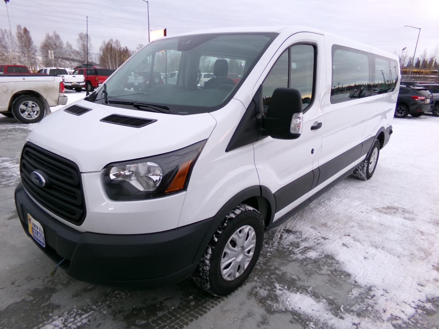 2019 White Ford Transit 350 Wagon Low Roof XL w/Sliding Pass. 148-in. WB (1FBZX2YM6KK) with an 3.7L V6 DOHC 24V engine, 6A transmission, located at 2630 Philips Field Rd., Fairbanks, AK, 99709, (907) 458-0593, 64.848068, -147.780609 - Photo#0