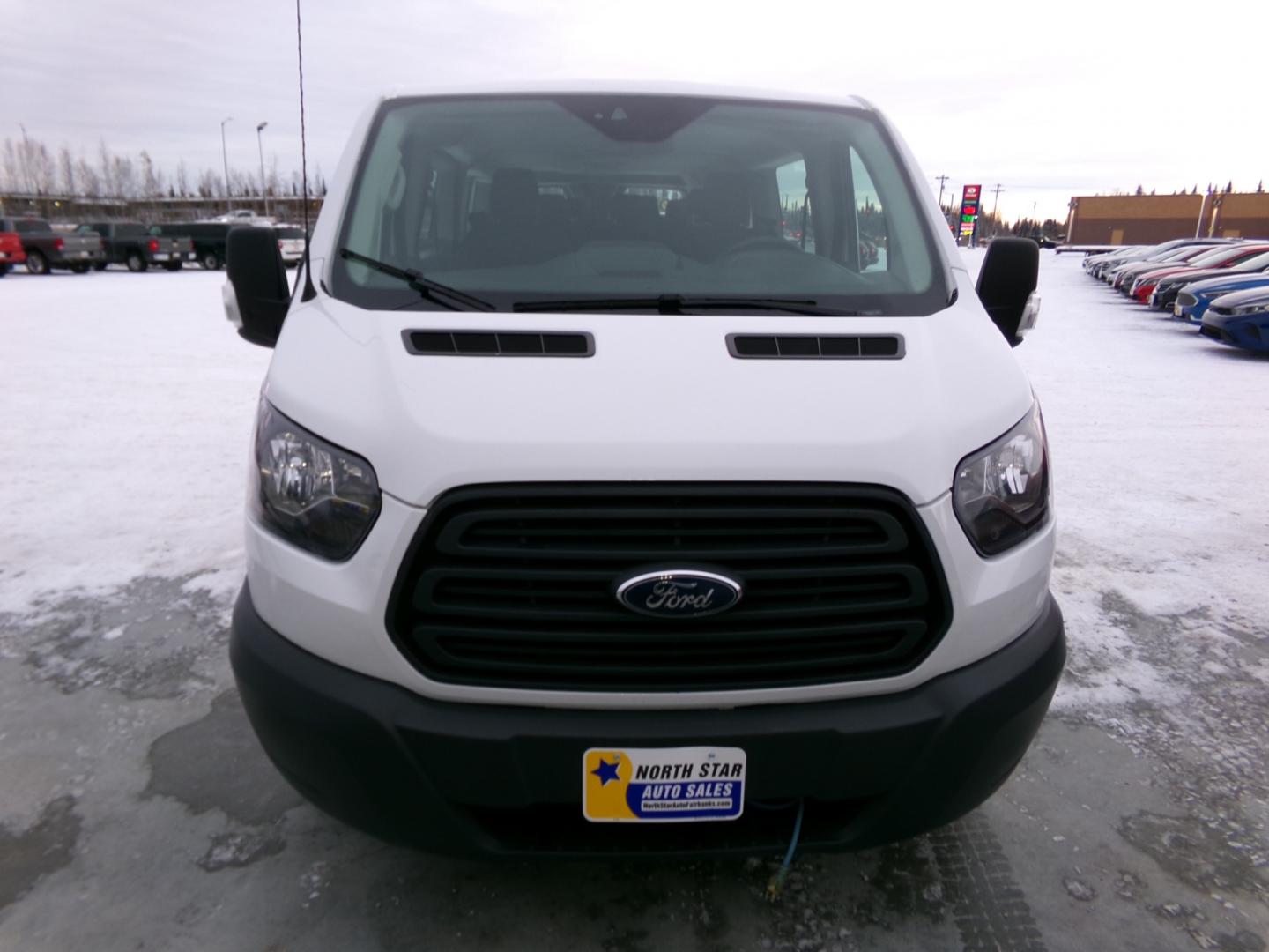 2019 White Ford Transit 350 Wagon Low Roof XL w/Sliding Pass. 148-in. WB (1FBZX2YM6KK) with an 3.7L V6 DOHC 24V engine, 6A transmission, located at 2630 Philips Field Rd., Fairbanks, AK, 99709, (907) 458-0593, 64.848068, -147.780609 - Photo#1