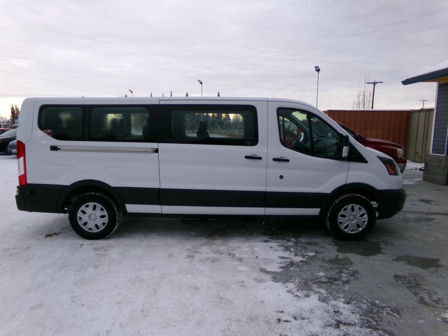 2019 White Ford Transit 350 Wagon Low Roof XL w/Sliding Pass. 148-in. WB (1FBZX2YM6KK) with an 3.7L V6 DOHC 24V engine, 6A transmission, located at 2630 Philips Field Rd., Fairbanks, AK, 99709, (907) 458-0593, 64.848068, -147.780609 - Photo#2