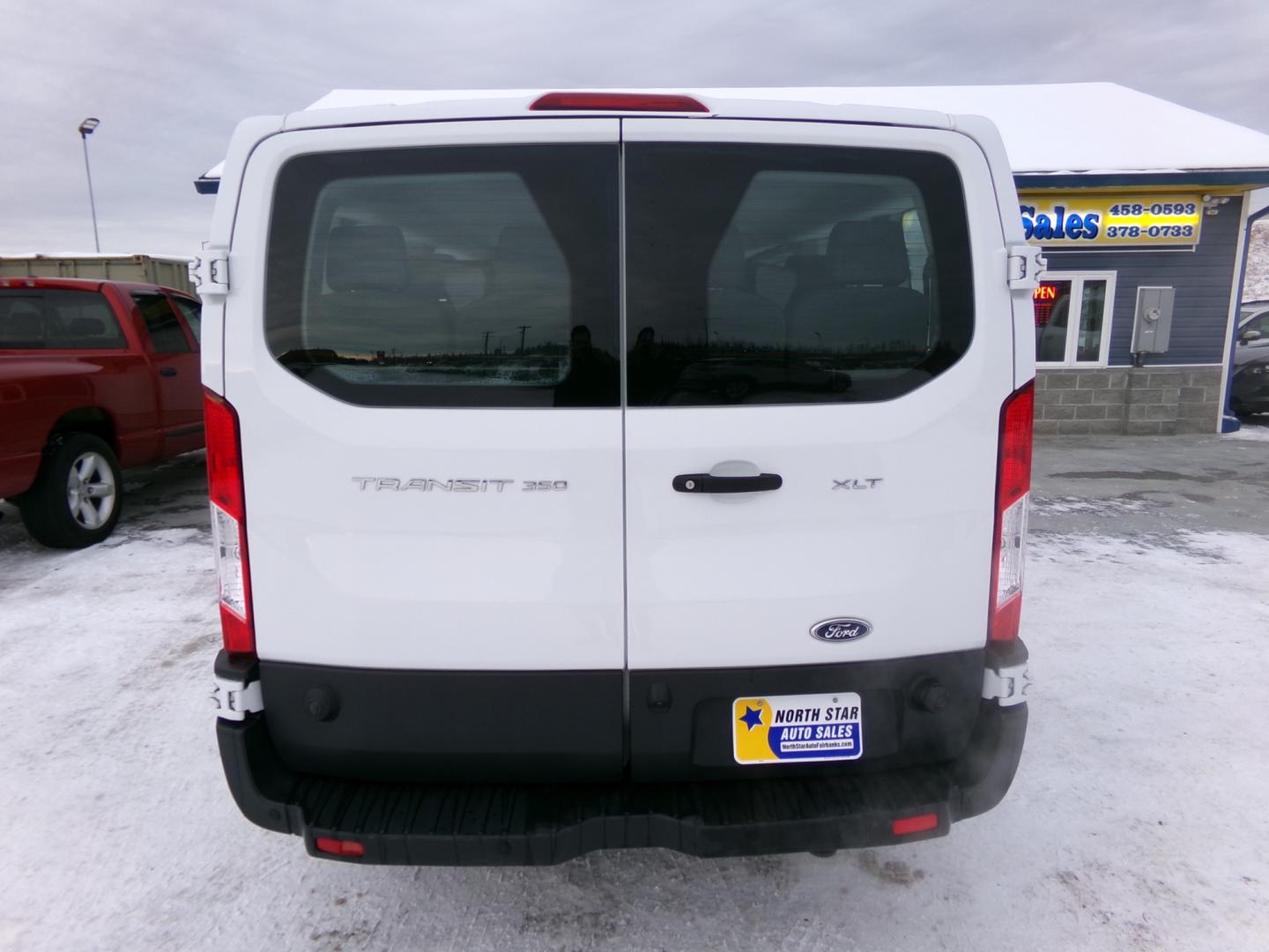 2019 White Ford Transit 350 Wagon Low Roof XL w/Sliding Pass. 148-in. WB (1FBZX2YM6KK) with an 3.7L V6 DOHC 24V engine, 6A transmission, located at 2630 Philips Field Rd., Fairbanks, AK, 99709, (907) 458-0593, 64.848068, -147.780609 - Photo#3