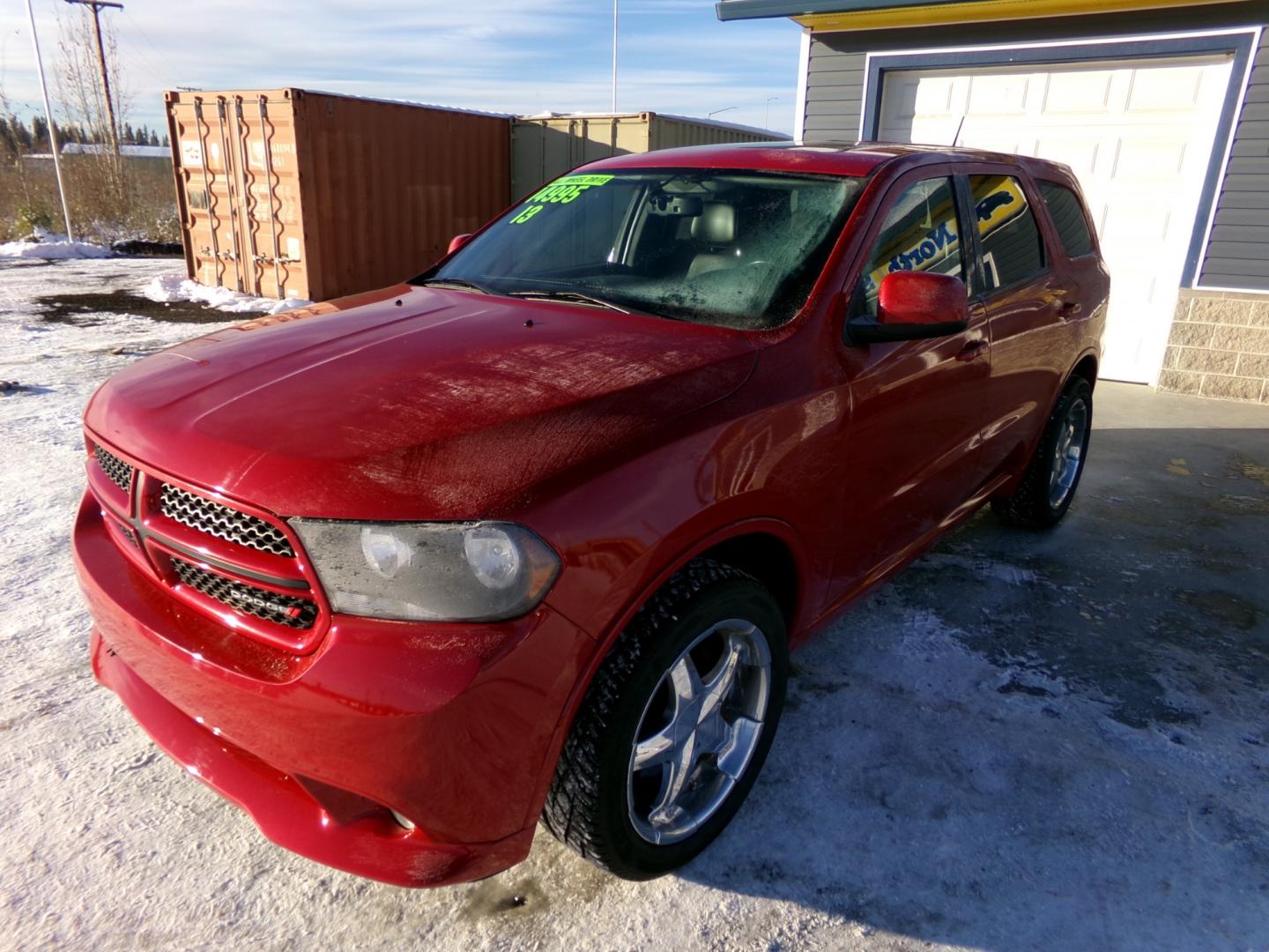 2013 Red Dodge Durango SXT AWD (1C4RDJAG4DC) with an 3.6L V6 DOHC 24V engine, 5-Speed Automatic transmission, located at 2630 Philips Field Rd., Fairbanks, AK, 99709, (907) 458-0593, 64.848068, -147.780609 - Photo#0