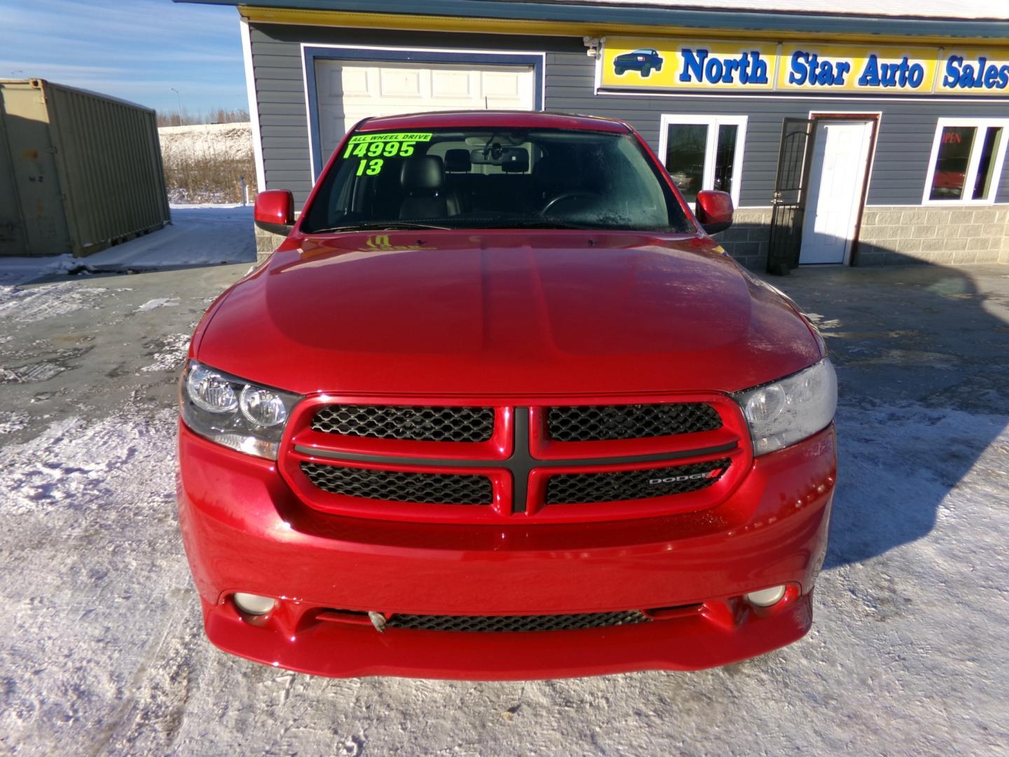 2013 Red Dodge Durango SXT AWD (1C4RDJAG4DC) with an 3.6L V6 DOHC 24V engine, 5-Speed Automatic transmission, located at 2630 Philips Field Rd., Fairbanks, AK, 99709, (907) 458-0593, 64.848068, -147.780609 - Photo#1