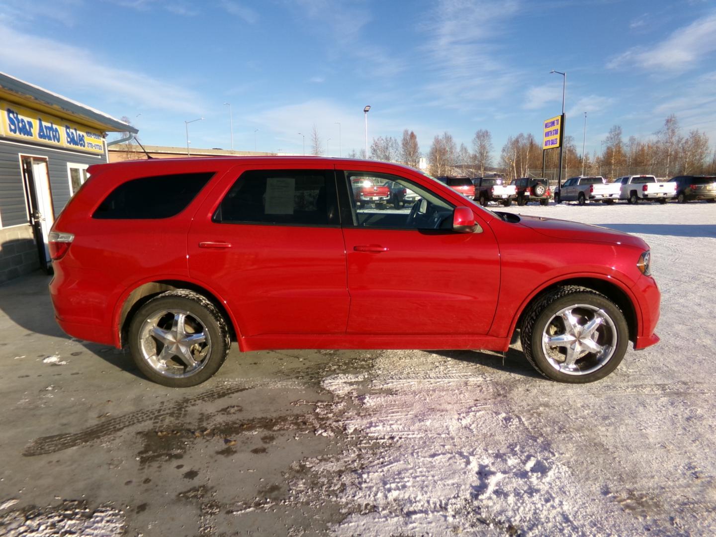 2013 Red Dodge Durango SXT AWD (1C4RDJAG4DC) with an 3.6L V6 DOHC 24V engine, 5-Speed Automatic transmission, located at 2630 Philips Field Rd., Fairbanks, AK, 99709, (907) 458-0593, 64.848068, -147.780609 - Photo#2