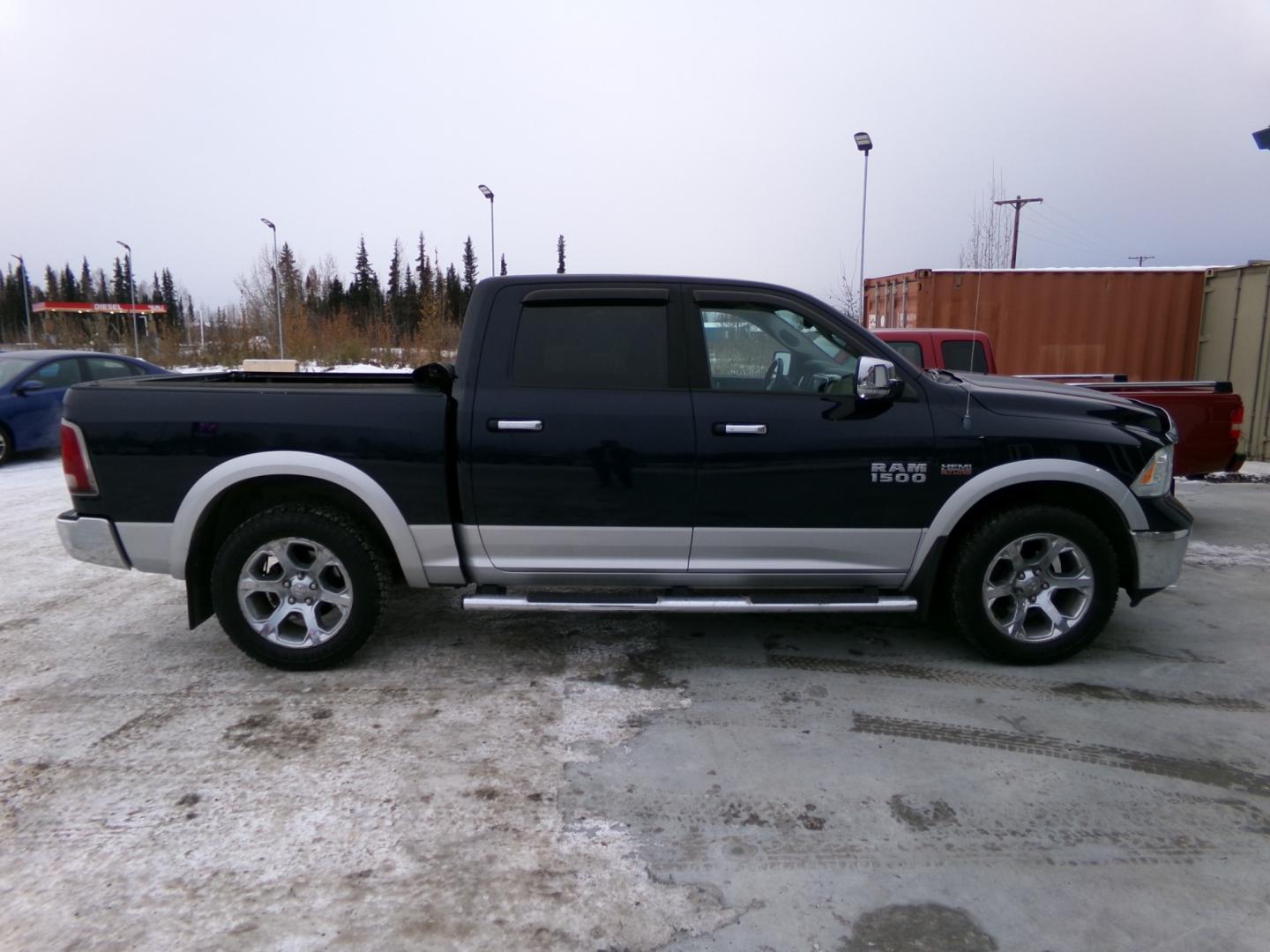 2013 Blue Dodge 1500 Laramie Crew Cab SWB 4WD (1C6RR7NT0DS) with an 5.7L V8 OHV 16V engine, 6-Speed Automatic transmission, located at 2630 Philips Field Rd., Fairbanks, AK, 99709, (907) 458-0593, 64.848068, -147.780609 - Photo#2