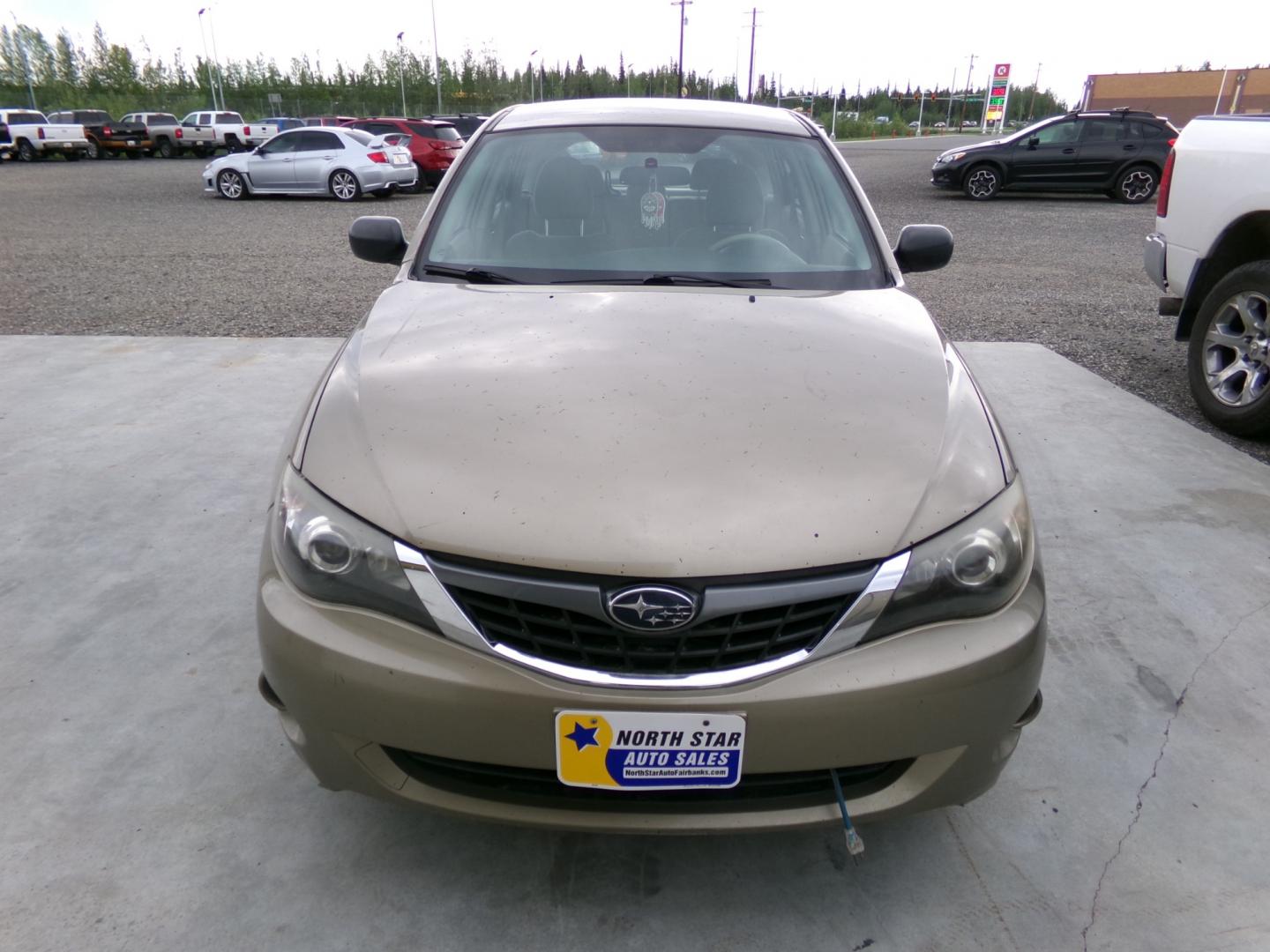 2008 Gold /Black Subaru Impreza Base (JF1GH61648G) with an 2.5L H4 SOHC 16V engine, 4-Speed Automatic Overdrive transmission, located at 2630 Philips Field Rd., Fairbanks, AK, 99709, (907) 458-0593, 64.848068, -147.780609 - Photo#1