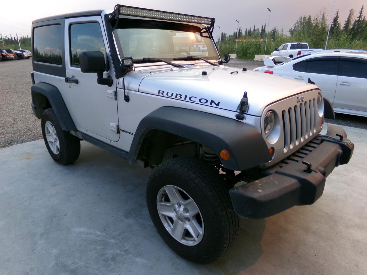 2012 Silver Jeep Wrangler Rubicon 4WD (1C4BJWCG3CL) with an 3.6L V6 DOHC 24V FFV engine, located at 2630 Philips Field Rd., Fairbanks, AK, 99709, (907) 458-0593, 64.848068, -147.780609 - Photo#0