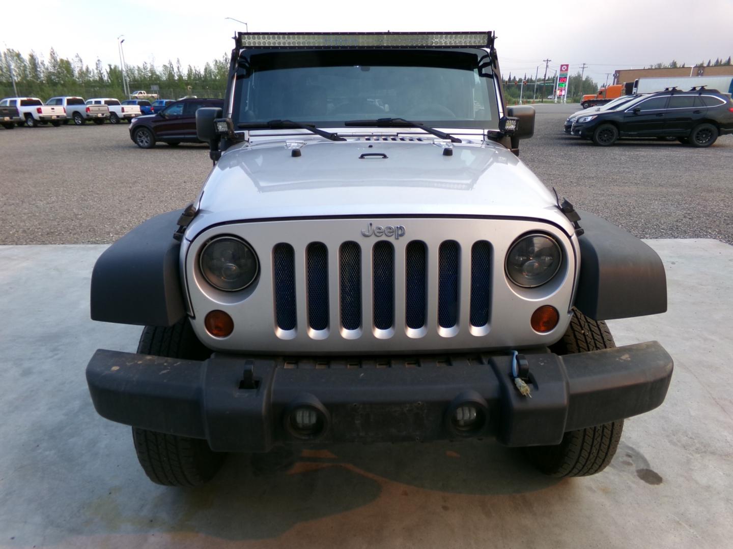 2012 Silver Jeep Wrangler Rubicon 4WD (1C4BJWCG3CL) with an 3.6L V6 DOHC 24V FFV engine, located at 2630 Philips Field Rd., Fairbanks, AK, 99709, (907) 458-0593, 64.848068, -147.780609 - Photo#1