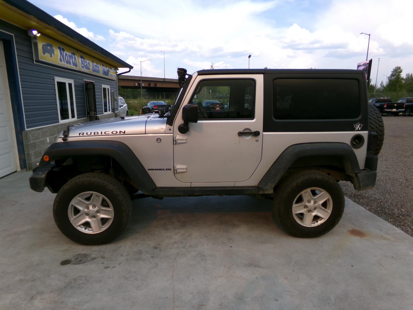 2012 Silver Jeep Wrangler Rubicon 4WD (1C4BJWCG3CL) with an 3.6L V6 DOHC 24V FFV engine, located at 2630 Philips Field Rd., Fairbanks, AK, 99709, (907) 458-0593, 64.848068, -147.780609 - Photo#2