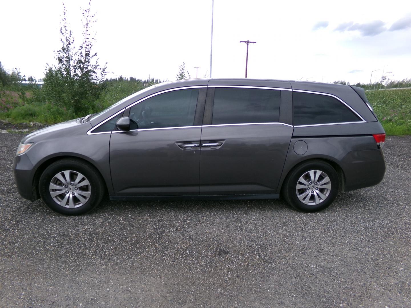 2014 Grey /Grey Honda Odyssey EX-L (5FNRL5H68EB) with an 3.5L V6 SOHC 24V engine, 6-Speed Automatic transmission, located at 2630 Philips Field Rd., Fairbanks, AK, 99709, (907) 458-0593, 64.848068, -147.780609 - Photo#2