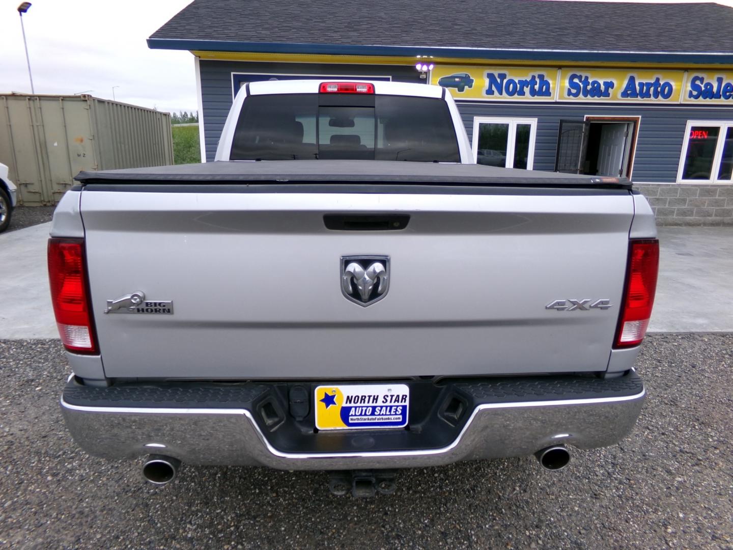 2016 Silver Dodge 1500 SLT Quad Cab 4WD (1C6RR7GT4GS) with an 5.7L V8 OHV 16V engine, 6A transmission, located at 2630 Philips Field Rd., Fairbanks, AK, 99709, (907) 458-0593, 64.848068, -147.780609 - Photo#3