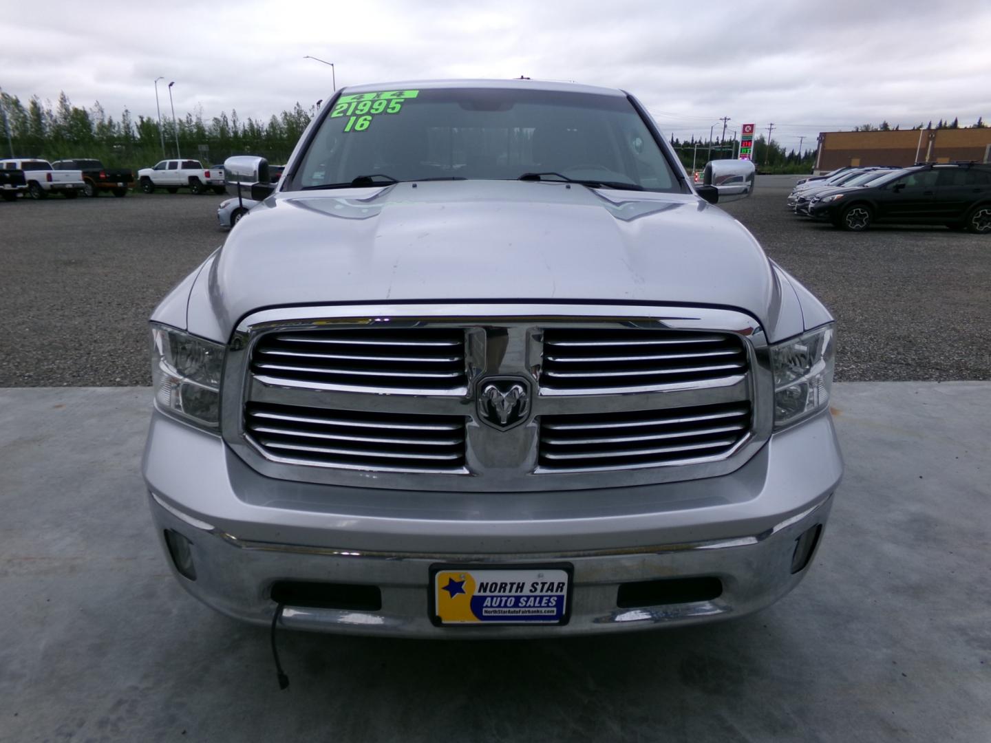 2016 Silver Dodge 1500 SLT Quad Cab 4WD (1C6RR7GT4GS) with an 5.7L V8 OHV 16V engine, 6A transmission, located at 2630 Philips Field Rd., Fairbanks, AK, 99709, (907) 458-0593, 64.848068, -147.780609 - Photo#1