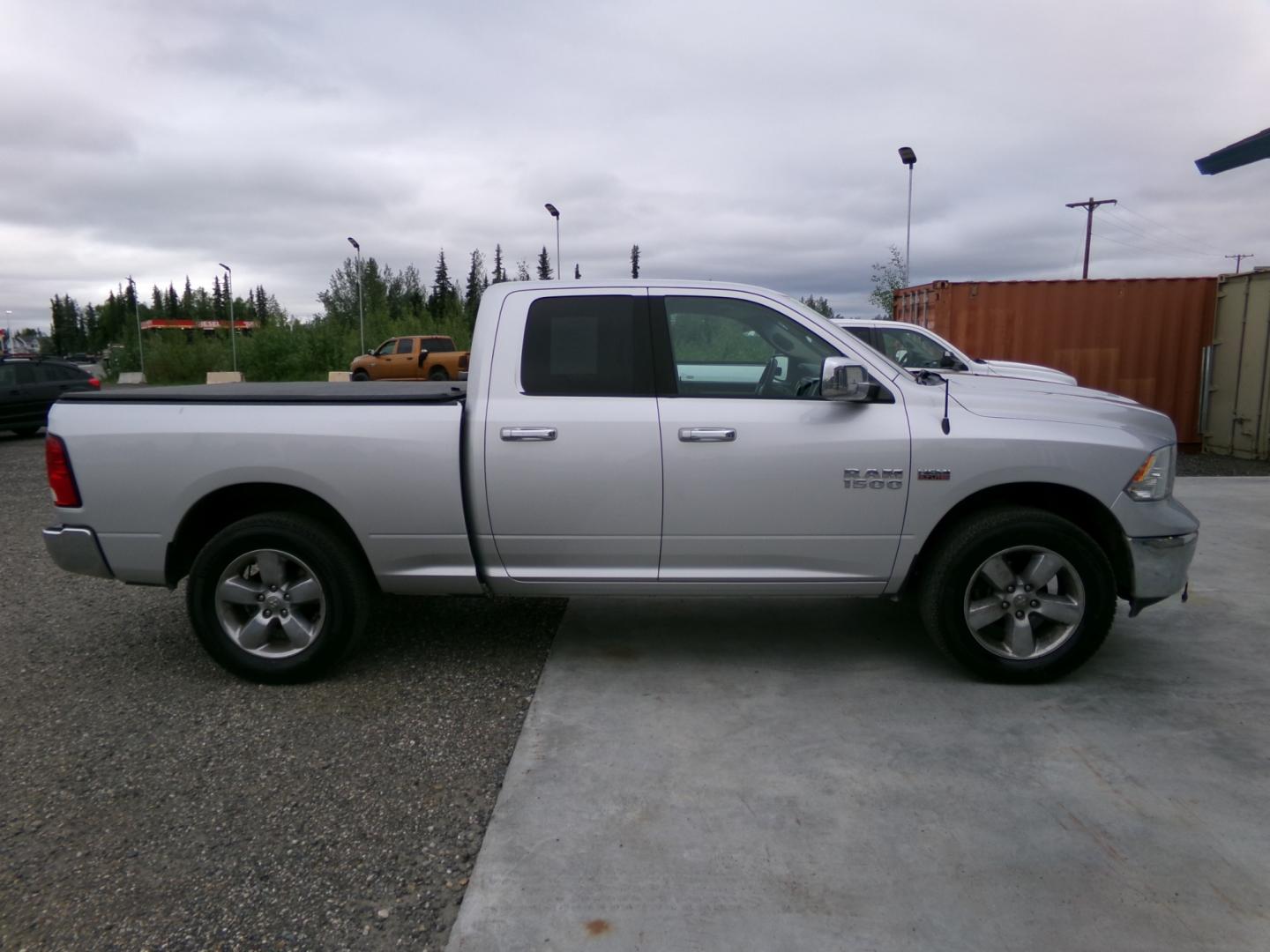 2016 Silver Dodge 1500 SLT Quad Cab 4WD (1C6RR7GT4GS) with an 5.7L V8 OHV 16V engine, 6A transmission, located at 2630 Philips Field Rd., Fairbanks, AK, 99709, (907) 458-0593, 64.848068, -147.780609 - Photo#2