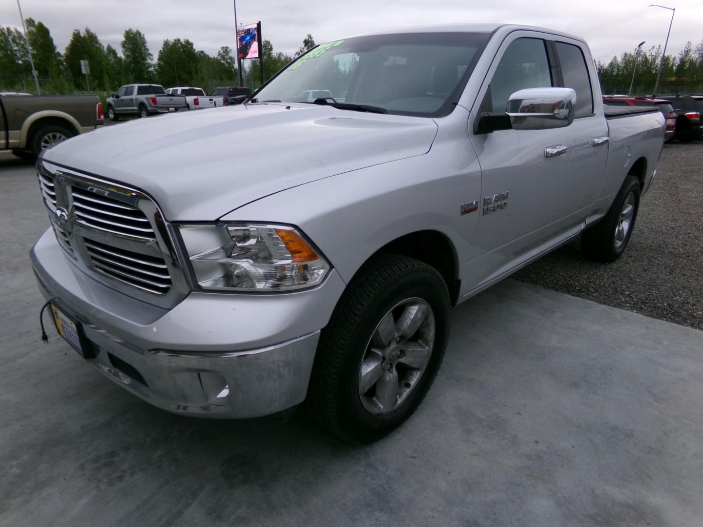 2016 Silver Dodge 1500 SLT Quad Cab 4WD (1C6RR7GT4GS) with an 5.7L V8 OHV 16V engine, 6A transmission, located at 2630 Philips Field Rd., Fairbanks, AK, 99709, (907) 458-0593, 64.848068, -147.780609 - Photo#0