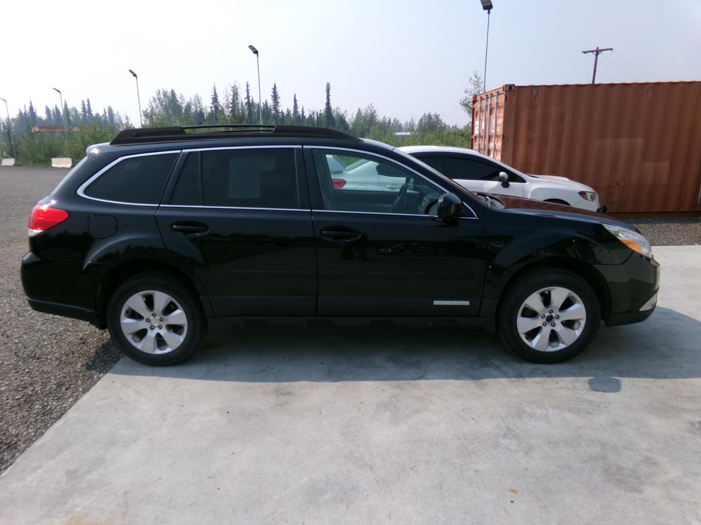 2012 Black Subaru Outback 2.5i Premium (4S4BRCGC2C3) with an 2.5L H4 DOHC 16V engine, located at 2630 Philips Field Rd., Fairbanks, AK, 99709, (907) 458-0593, 64.848068, -147.780609 - Photo#2