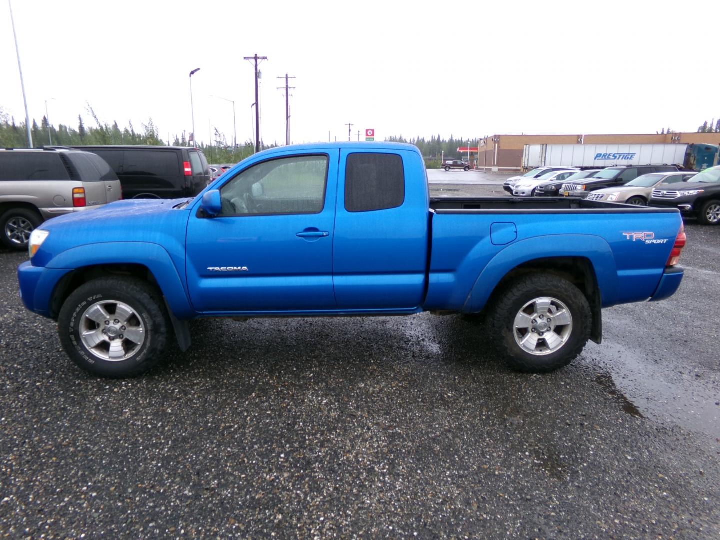 2005 Blue /Black Toyota Tacoma Access Cab V6 Automatic 4WD (5TEUU42N75Z) with an 4.0L V6 DOHC 24V engine, 5-Speed Automatic Overdrive transmission, located at 2630 Philips Field Rd., Fairbanks, AK, 99709, (907) 458-0593, 64.848068, -147.780609 - Photo#2