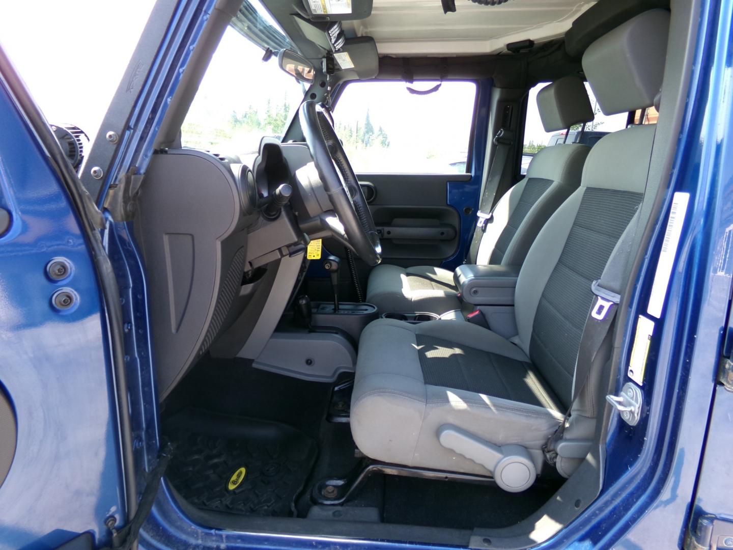 2010 Blue Jeep Wrangler Unlimited Rubicon 4WD (1J4BA6H1XAL) with an 3.8L V6 OHV 12V engine, located at 2630 Philips Field Rd., Fairbanks, AK, 99709, (907) 458-0593, 64.848068, -147.780609 - Photo#4