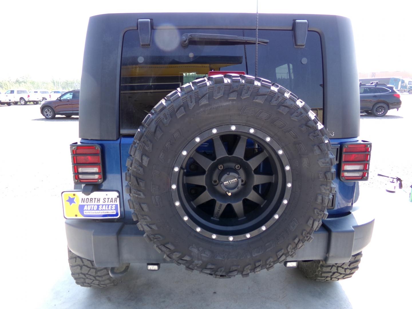 2010 Blue Jeep Wrangler Unlimited Rubicon 4WD (1J4BA6H1XAL) with an 3.8L V6 OHV 12V engine, located at 2630 Philips Field Rd., Fairbanks, AK, 99709, (907) 458-0593, 64.848068, -147.780609 - Photo#3