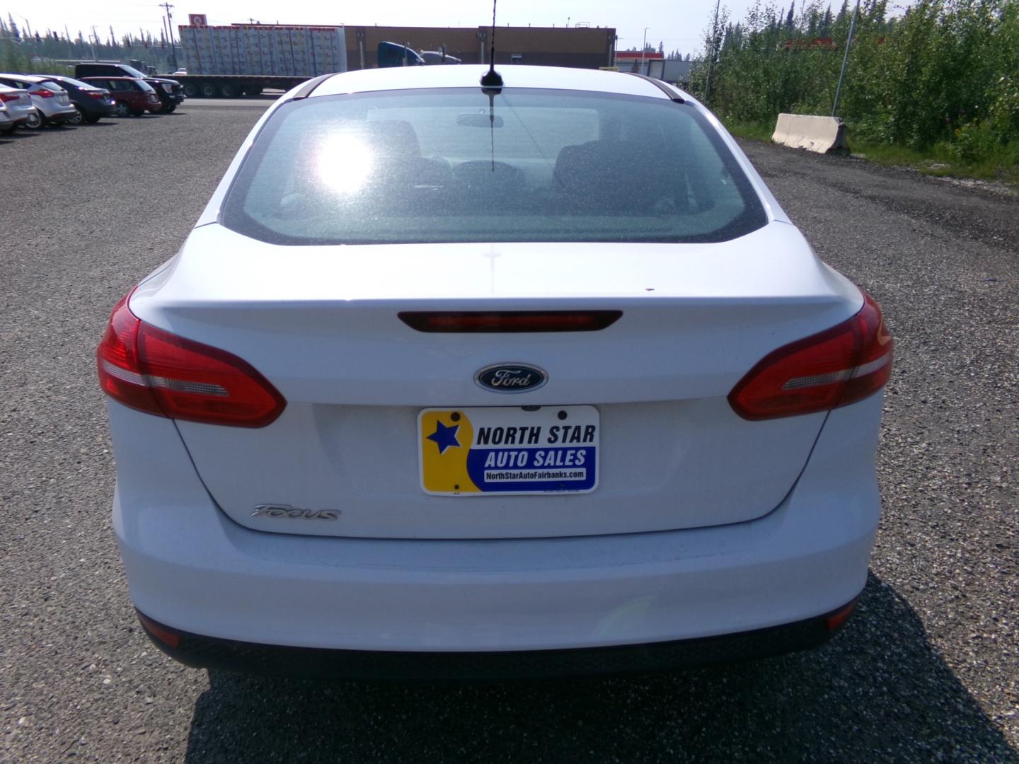 2015 White Ford Focus S Sedan (1FADP3E27FL) with an 2.0L L4 DOHC 16V engine, 5-Speed Automatic transmission, located at 2630 Philips Field Rd., Fairbanks, AK, 99709, (907) 458-0593, 64.848068, -147.780609 - Photo#3