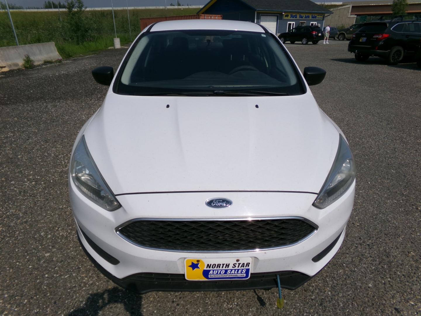 2015 White Ford Focus S Sedan (1FADP3E27FL) with an 2.0L L4 DOHC 16V engine, 5-Speed Automatic transmission, located at 2630 Philips Field Rd., Fairbanks, AK, 99709, (907) 458-0593, 64.848068, -147.780609 - Photo#1