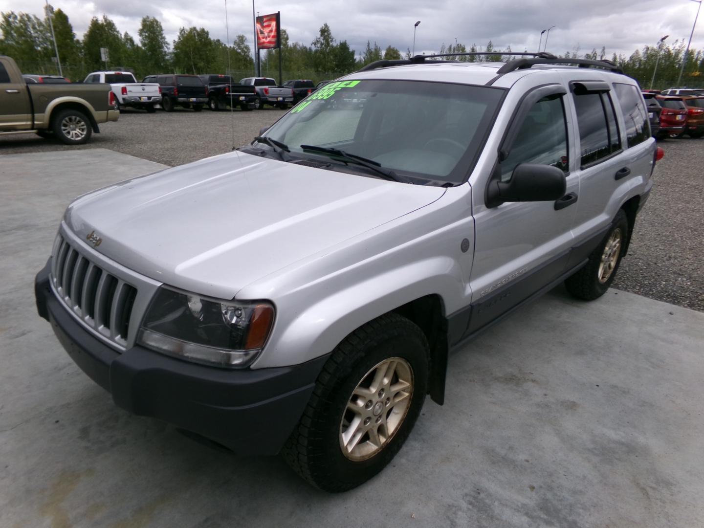 2004 Silver /Black Jeep Grand Cherokee Columbia Edition 4WD (1J4GW48S64C) with an 4.0L L6 OHV 12V engine, 4-Speed Automatic Overdrive transmission, located at 2630 Philips Field Rd., Fairbanks, AK, 99709, (907) 458-0593, 64.848068, -147.780609 - Photo#0