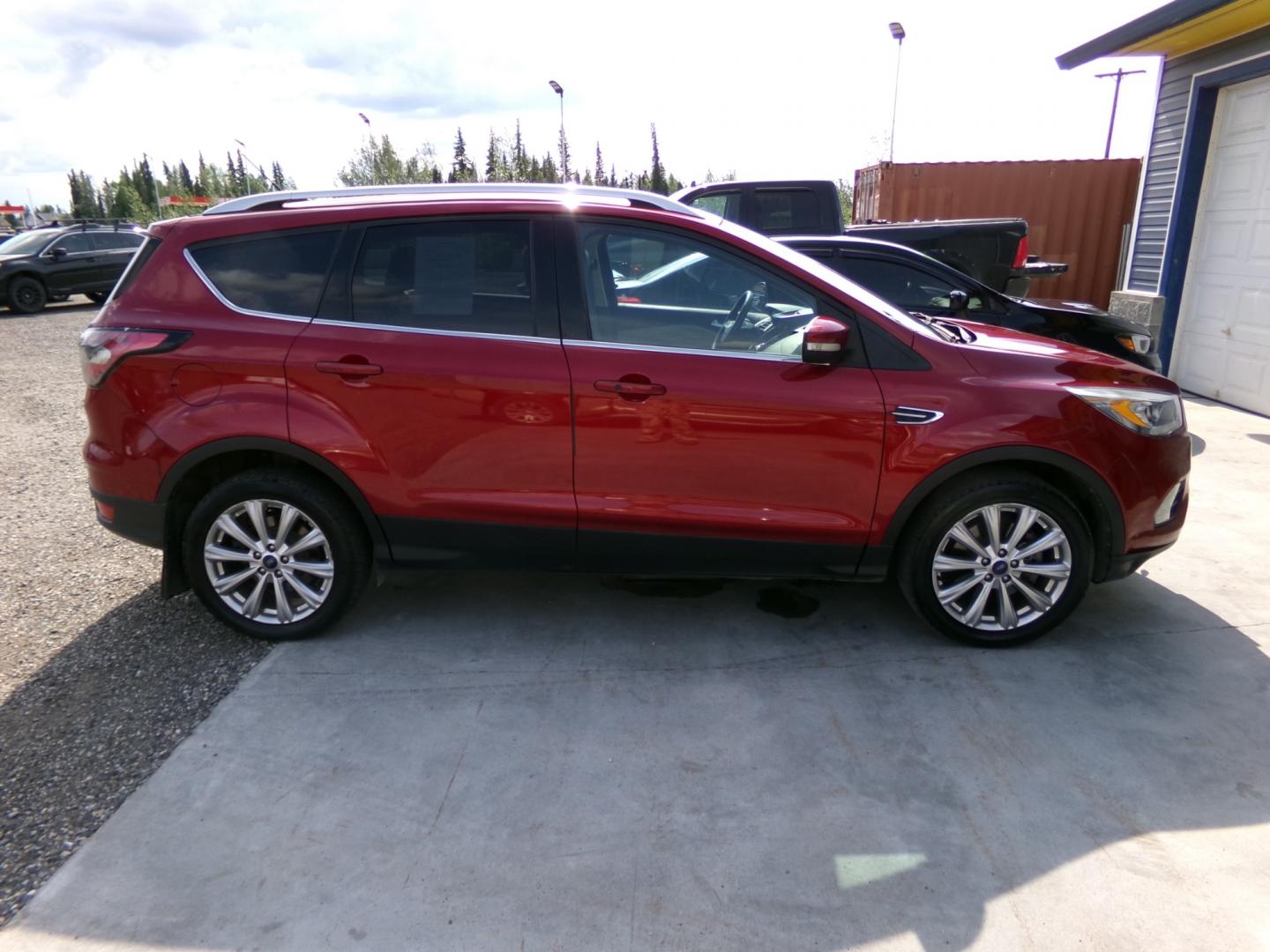 2017 Red Ford Escape Titanium 4WD (1FMCU9J90HU) with an 2.0L L4 DOHC 16V engine, 6A transmission, located at 2630 Philips Field Rd., Fairbanks, AK, 99709, (907) 458-0593, 64.848068, -147.780609 - Photo#2