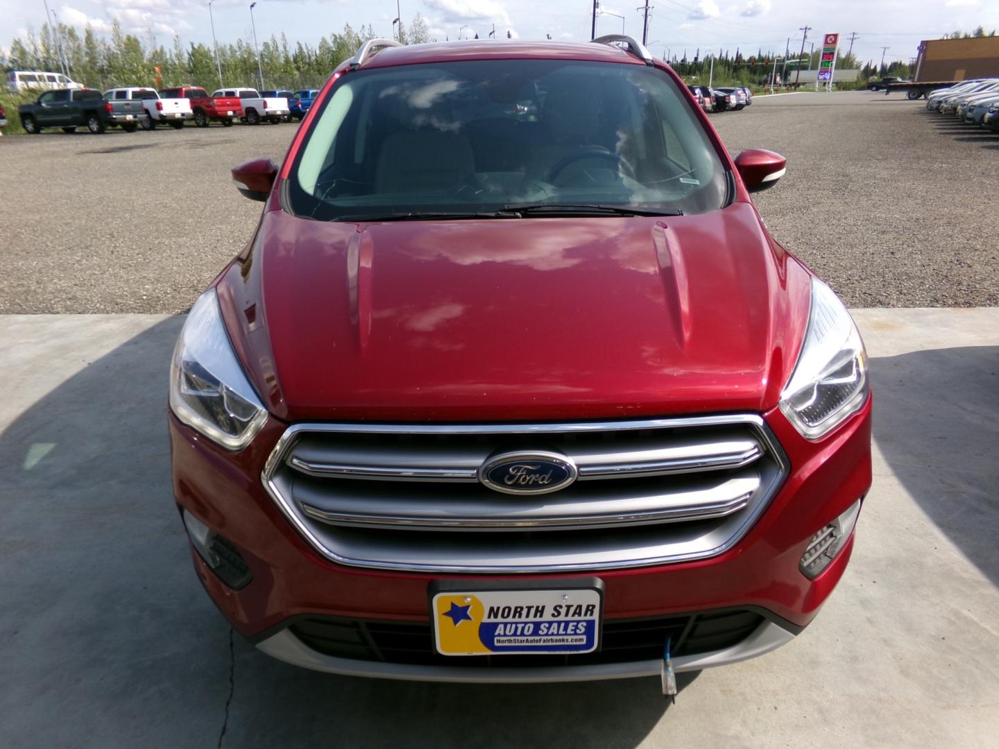 2017 Red Ford Escape Titanium 4WD (1FMCU9J90HU) with an 2.0L L4 DOHC 16V engine, 6A transmission, located at 2630 Philips Field Rd., Fairbanks, AK, 99709, (907) 458-0593, 64.848068, -147.780609 - Photo#1