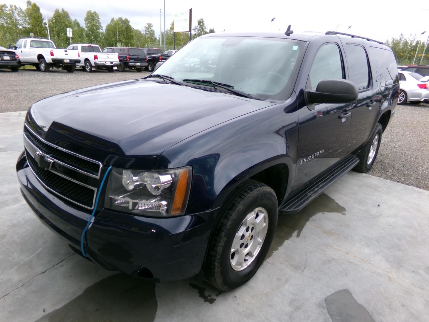 2009 Blue Chevrolet Suburban LS 1500 4WD (1GNFK16319R) with an 5.3L V8 OHV 16V FFV engine, 4-Speed Automatic transmission, located at 2630 Philips Field Rd., Fairbanks, AK, 99709, (907) 458-0593, 64.848068, -147.780609 - Photo#0