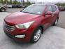 2013 Red Hyundai Santa Fe (5XYZW3LA4DG) , located at 2630 Philips Field Rd., Fairbanks, AK, 99709, (907) 458-0593, 64.848068, -147.780609 - Photo#0