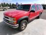 1999 Red Chevrolet Suburban K1500 4WD (1GNFK16R9XJ) with an 5.7L V8 OHV 16V engine, 4-Speed Automatic Overdrive transmission, located at 2630 Philips Field Rd., Fairbanks, AK, 99709, (907) 458-0593, 64.848068, -147.780609 - Photo#0