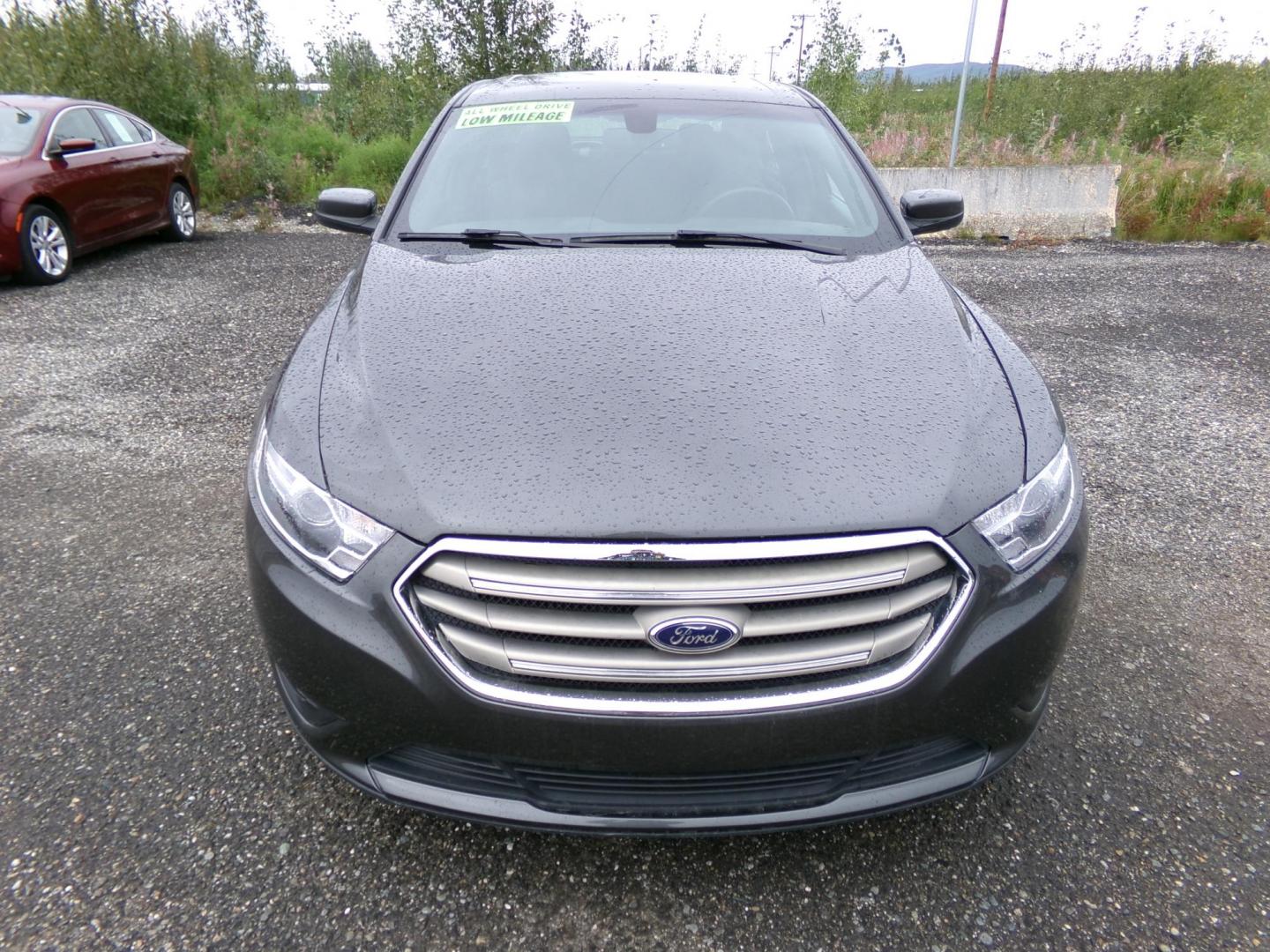 2015 /Grey Ford Taurus SEL AWD (1FAHP2H89FG) with an 3.5L V6 DOHC 24V engine, 6-Speed Automatic transmission, located at 2630 Philips Field Rd., Fairbanks, AK, 99709, (907) 458-0593, 64.848068, -147.780609 - Photo#1